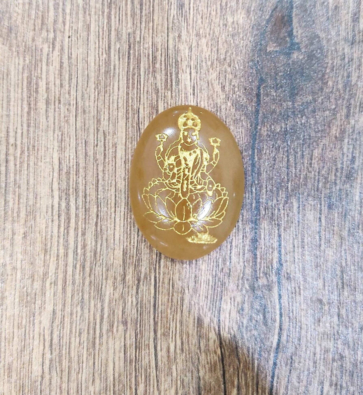 Yellow aventurine lakshmi coin