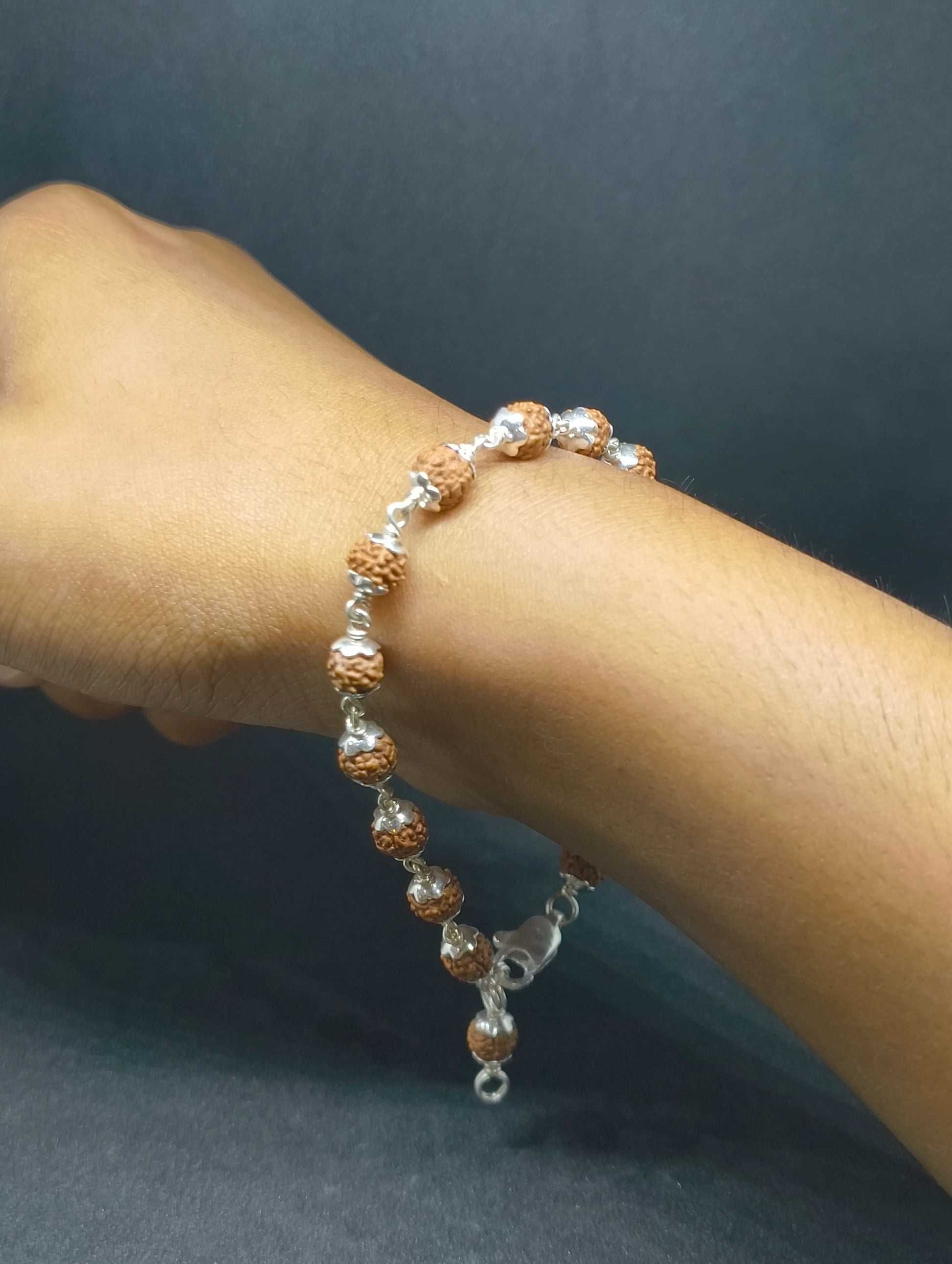 rudraksha bracelet in silver caps