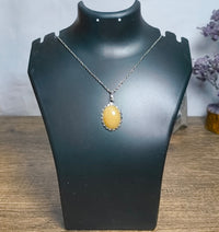 yellow pendant locket