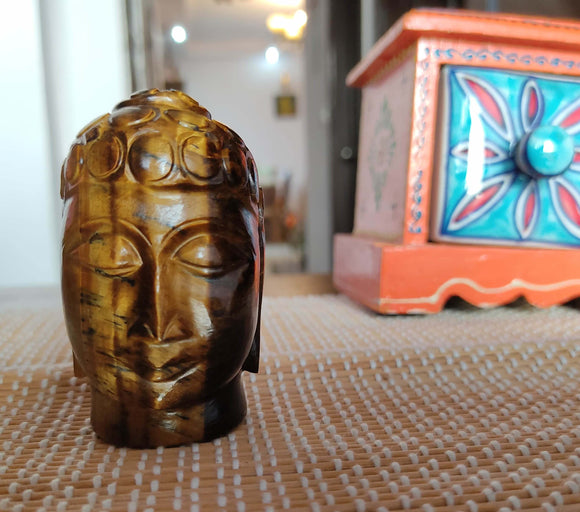 Buddha idol tiger eye gemstone