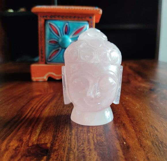 Rose quartz stone Buddha head idol